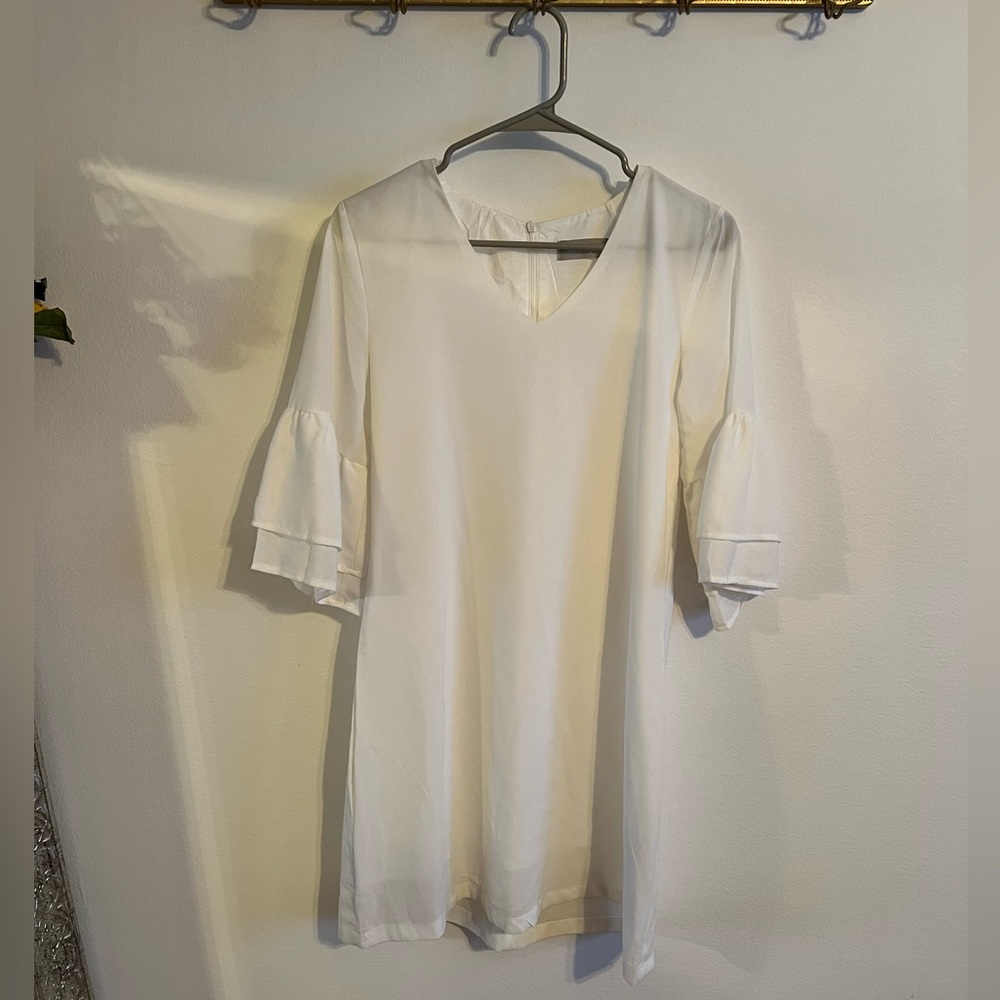 White shift dress. Bridal showers, office, casual.